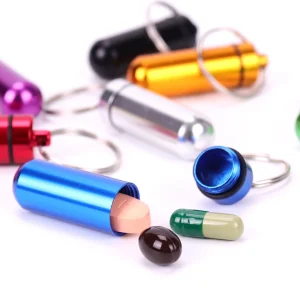 Medicinbehållare med nyckelring