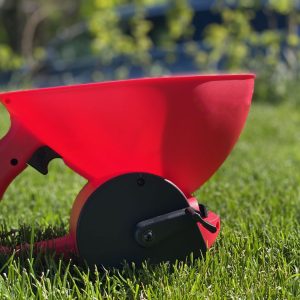 Handspridare med vev gräsgödsel